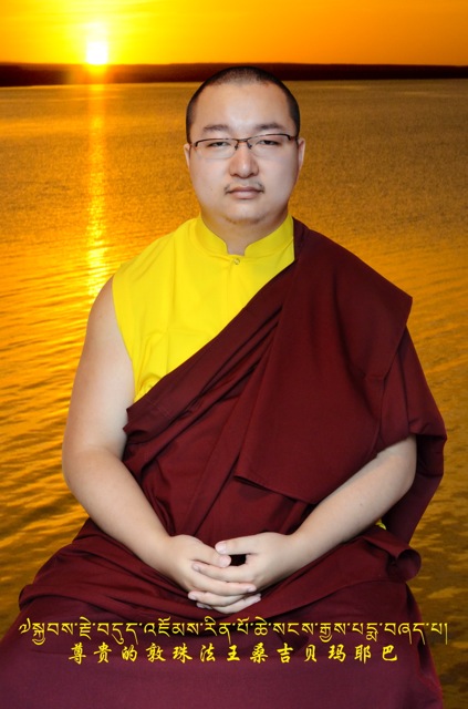 Dudjom_Yangsi_Rinpoche_with_sun.jpeg